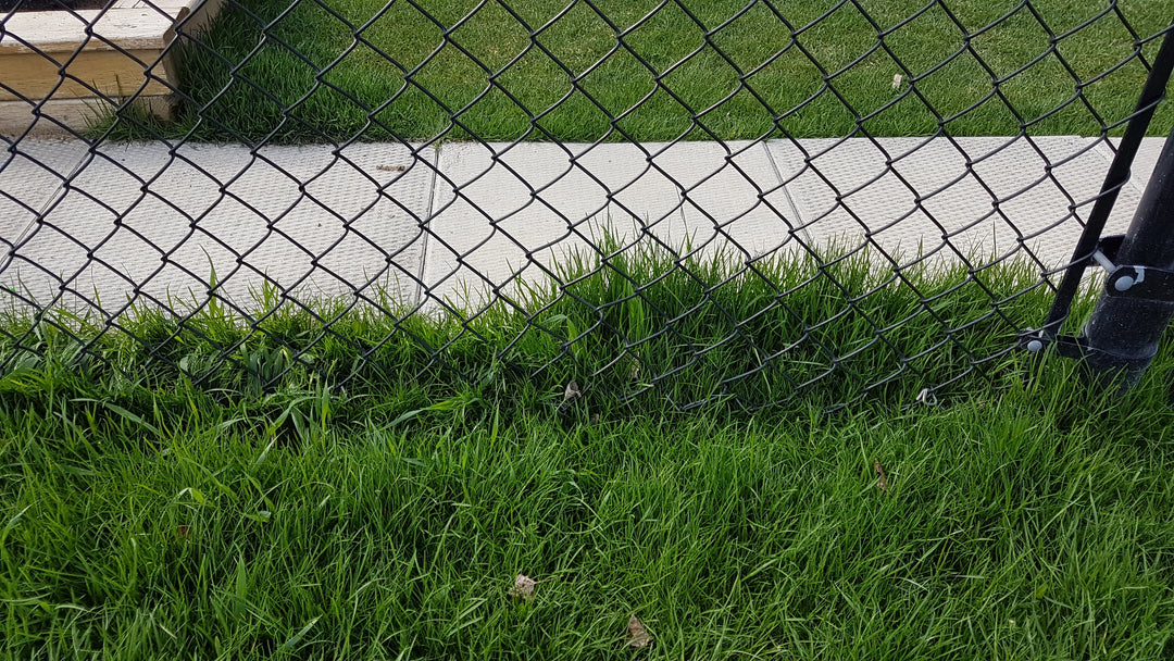 Fence Armor EasyTrim™ – Chain Link Fence Bottom Guard Fence Armor EasyTrim™ – Chain Link Fence Bottom Guard 4' Foot Sections - Set of 12 (48') Fence Armor